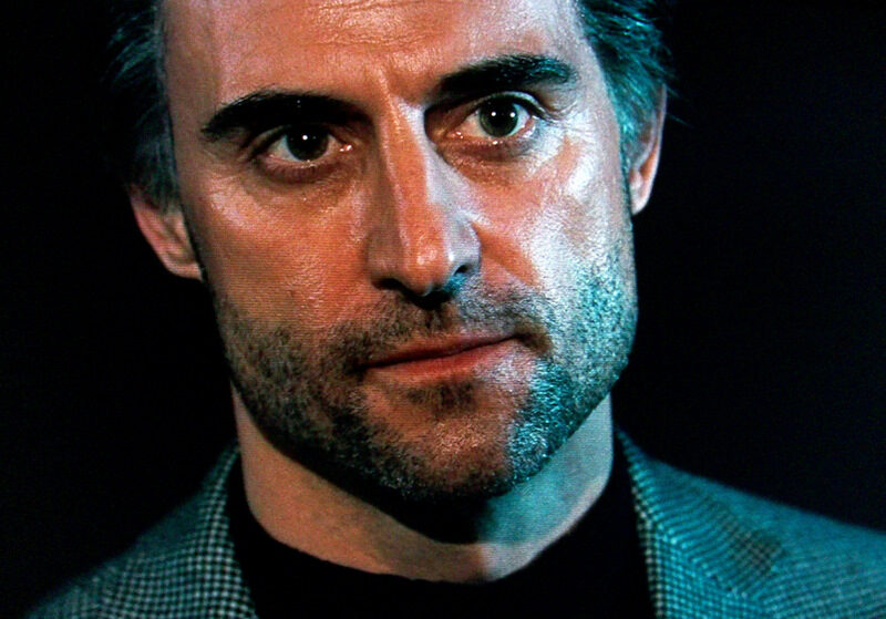 body-of-lies_mark-strong_grey-jacket-close-up-8777954