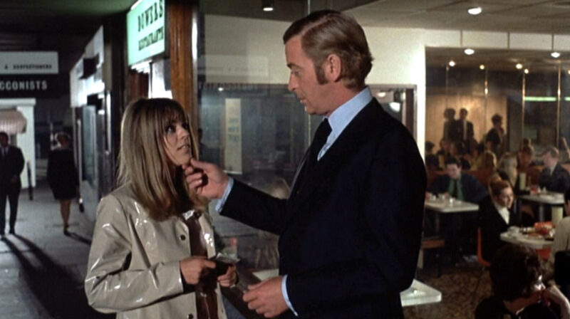 get-carter_petra-markham-pvc-michael-caine-blue-suit_mid-7056472