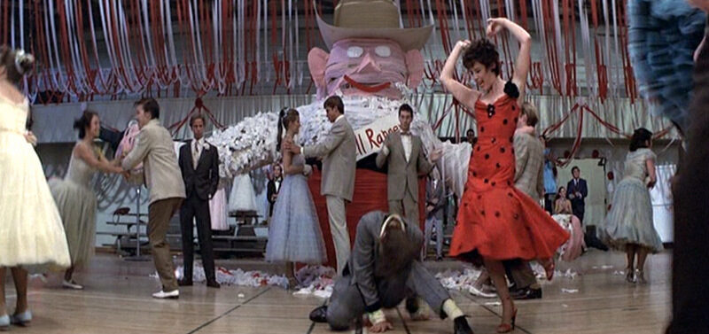 grease_stockard-channing_red-dress-dancing-bmp-4698135