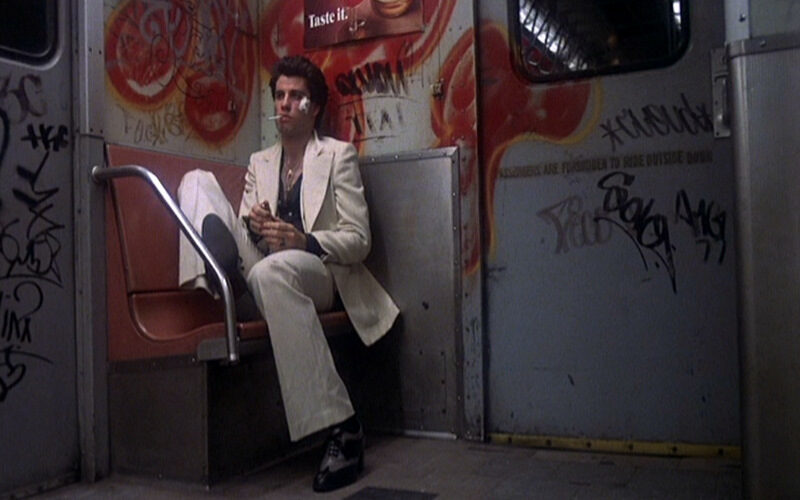 saturday-night-fever_john-travolta_white-suit-train-smoking-bmp-1-6082016