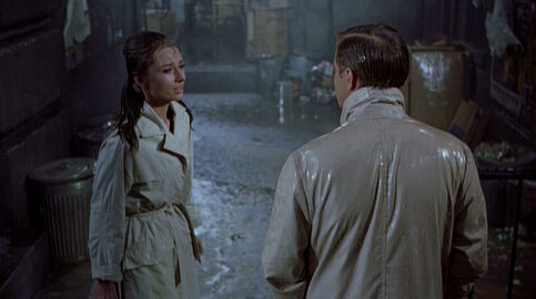 breakfast-at-tiffanys_audrey-hepburn-george-peppard-mid-raincoats_cap-8164245