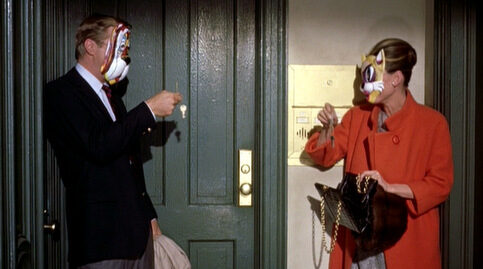 breakfast-at-tiffanys_george-peppard-audrey-hepburn-cat-mask_cap-8837381