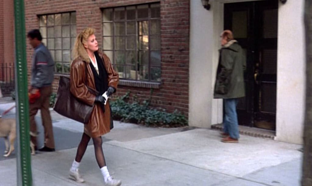 working-girl_melanie-griffith_trainers-leather-coat-full-bmp-1030411