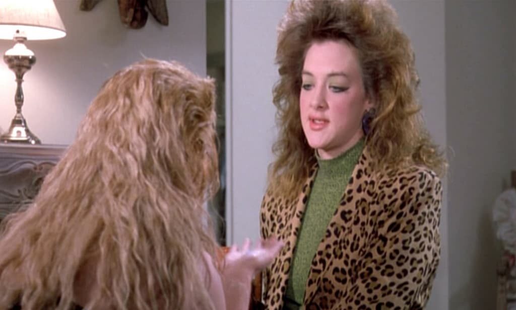 working-girl_joan-cusack-leopard-skin-mid-bmp-2312829